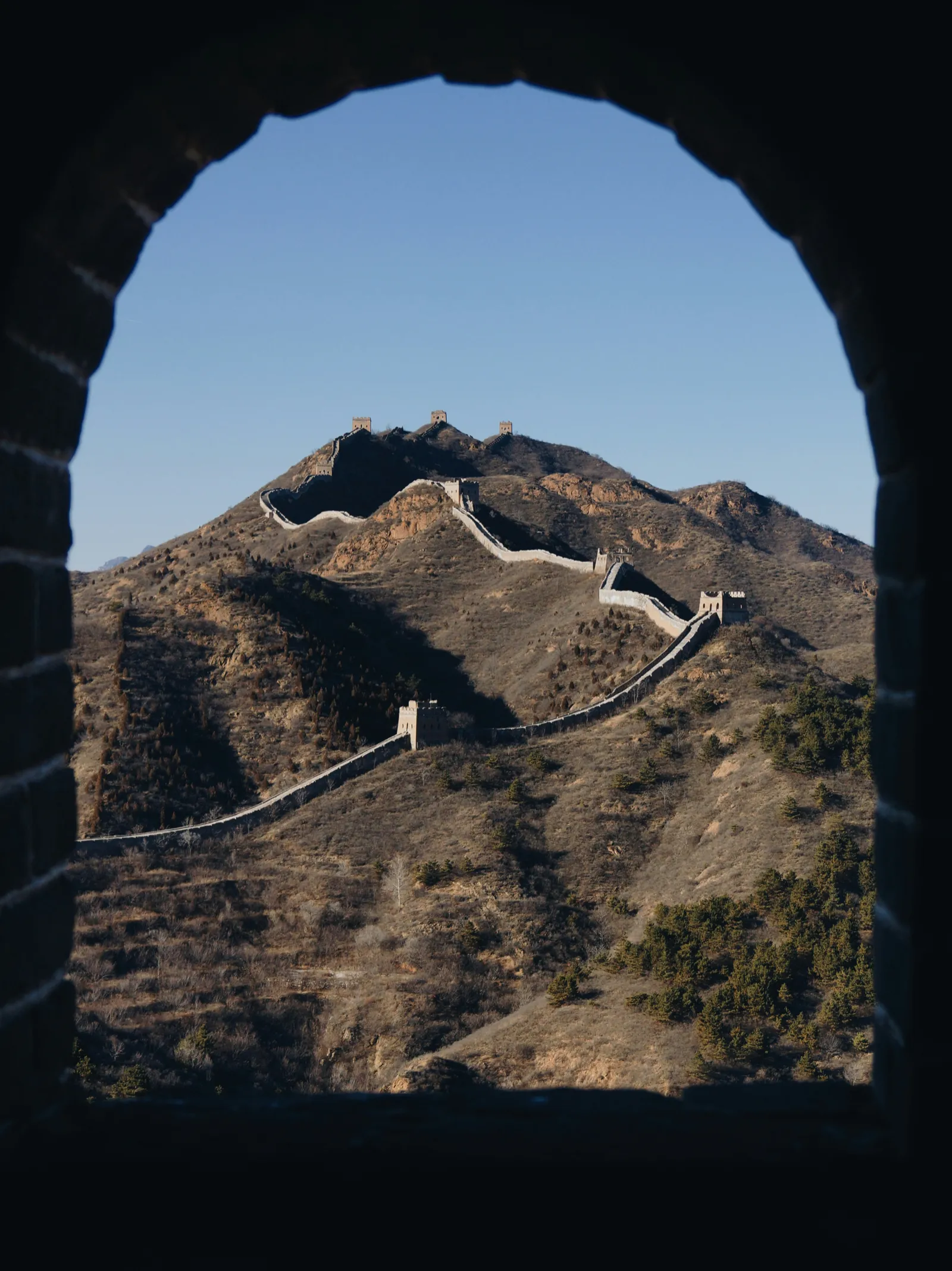 The Great Wall of China stretching across the mountains
